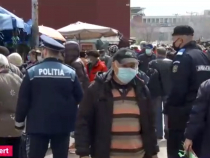Explicațiile românilor din piață pentru masca purtată sub nas: „Nu mi-e teamă. Nu cred în el, dar din obligativitatea legii, port”
