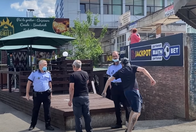 Un român întors din Belgia i-a umilit pe doi poliţişti români, în plină stradă: „Pac, pac şi am plecat” - VIDEO 