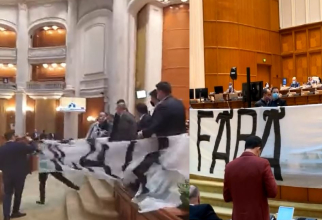 Scandal monstru în Parlament. Un deputat PSD a smuls bannerul uriaș adus de AUR