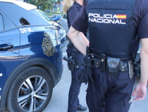 Spania. Doi români arestați pentru că au furat o casă de marcat dintr-o unitate hotelieră