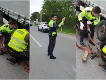 „Așa da...Respect!” Șofer român de TIR, ajutat de polițiști să repare o pană: „Mai sunt și oameni cu suflet, nu doar cu funcții!” - VIDEO